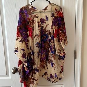 Nude and floral open front shrug